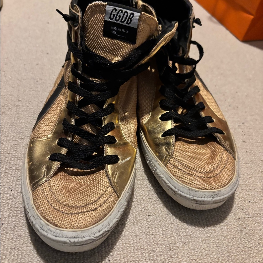 Golden Goose Gold and Black Sneakers